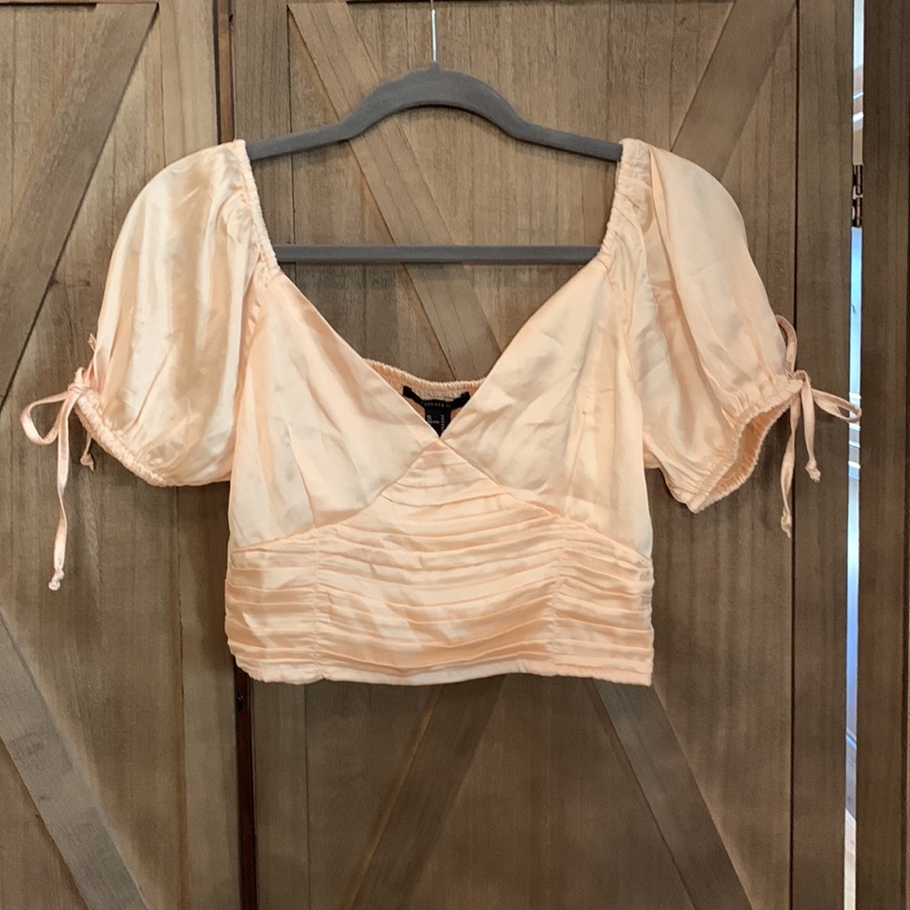 NWT Forever 21 Blush Crop top with short sleeves - satin like material. Medium.